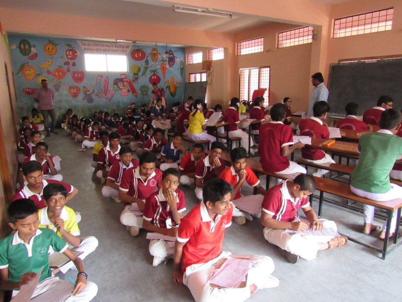 Pastor Jim and students at church